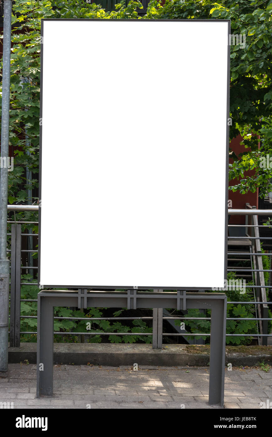 A blank ad space sign isolated in the street Stock Photo