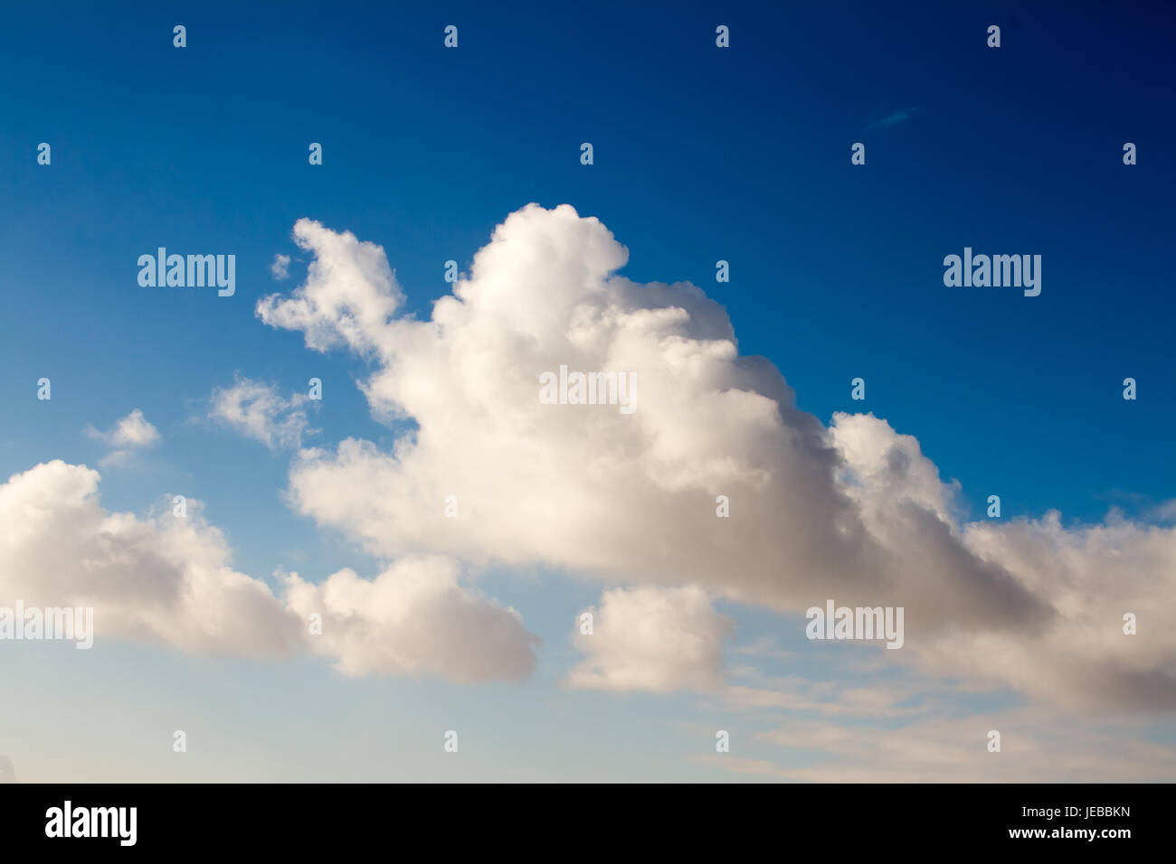 Large and beautiful Cumulus clouds on blue sky Stock Photo - Alamy