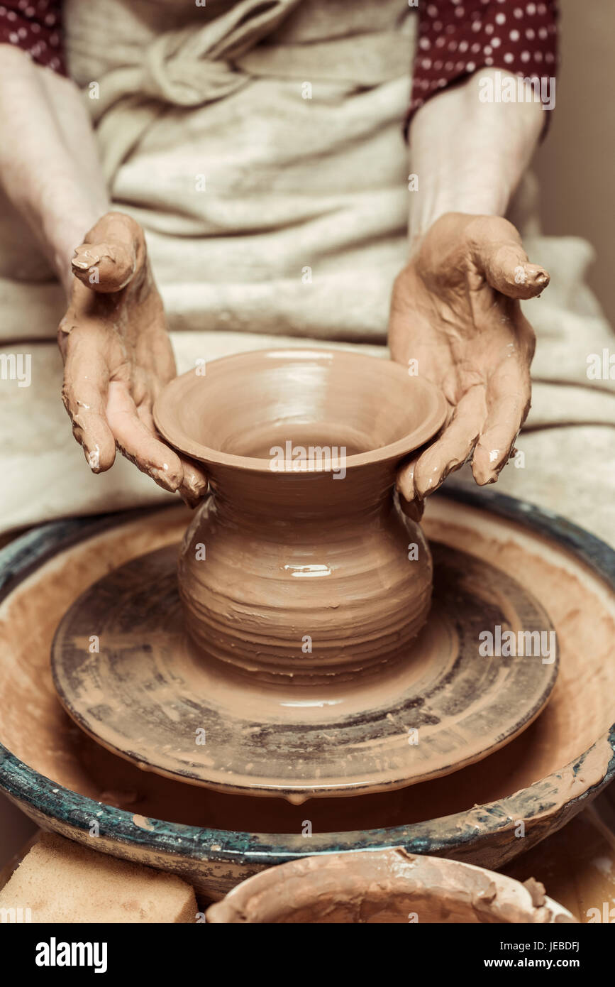 Close up of female hands working on potters wheel Stock Photo Alamy