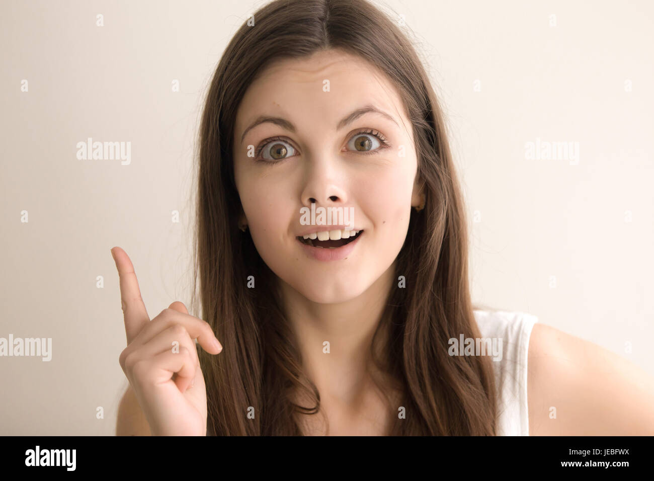 Headshot portrait of excited woman with great idea Stock Photo