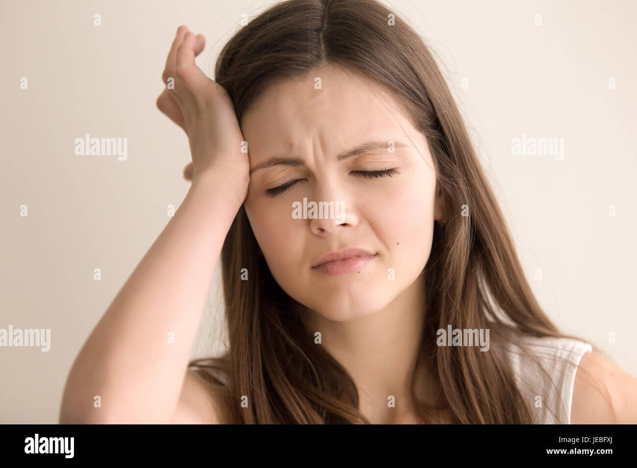Headshot portrait of woman suffering of headache Stock Photo Alamy