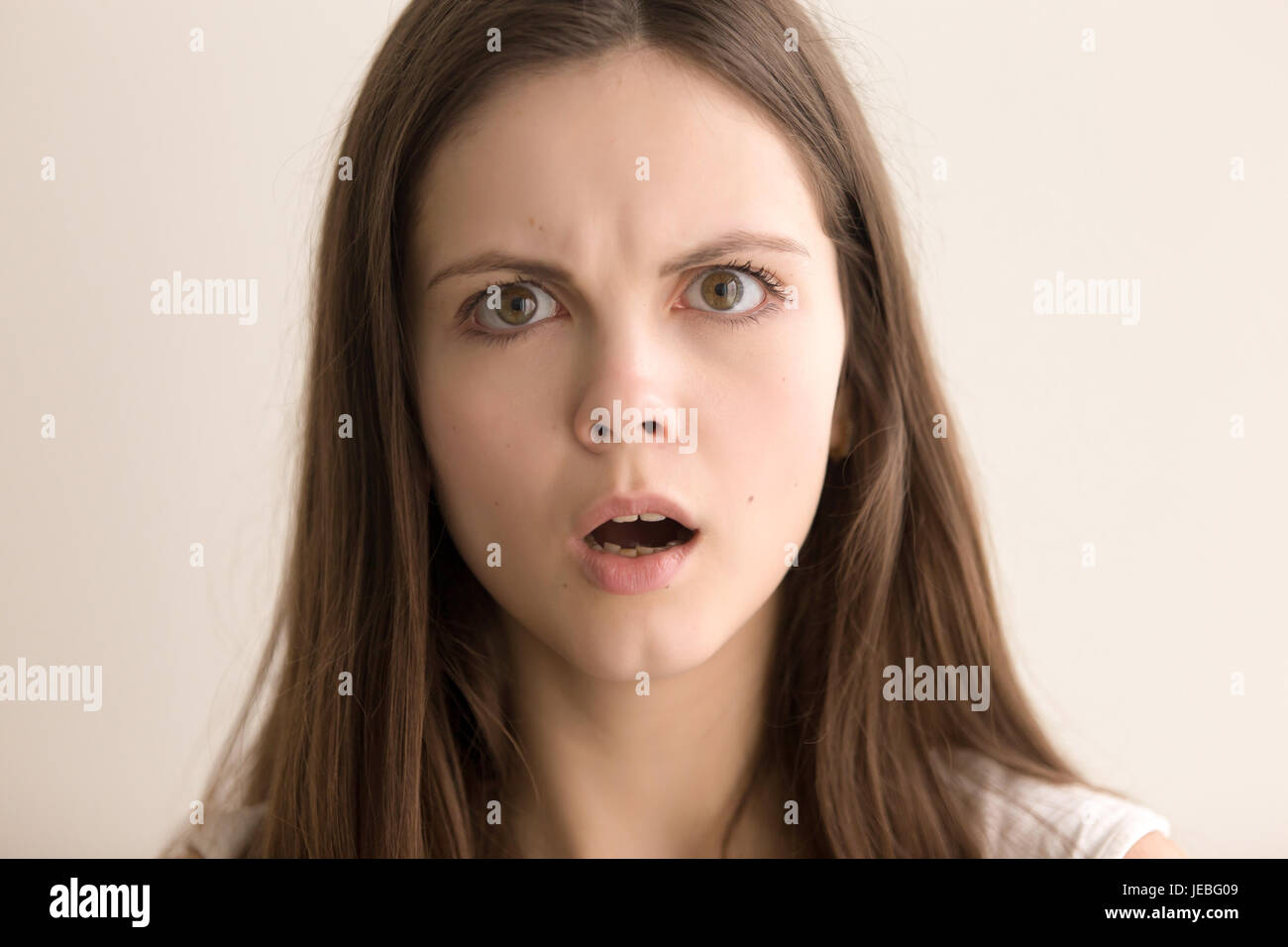 Shocked astonished woman face hi-res stock photography and images - Alamy