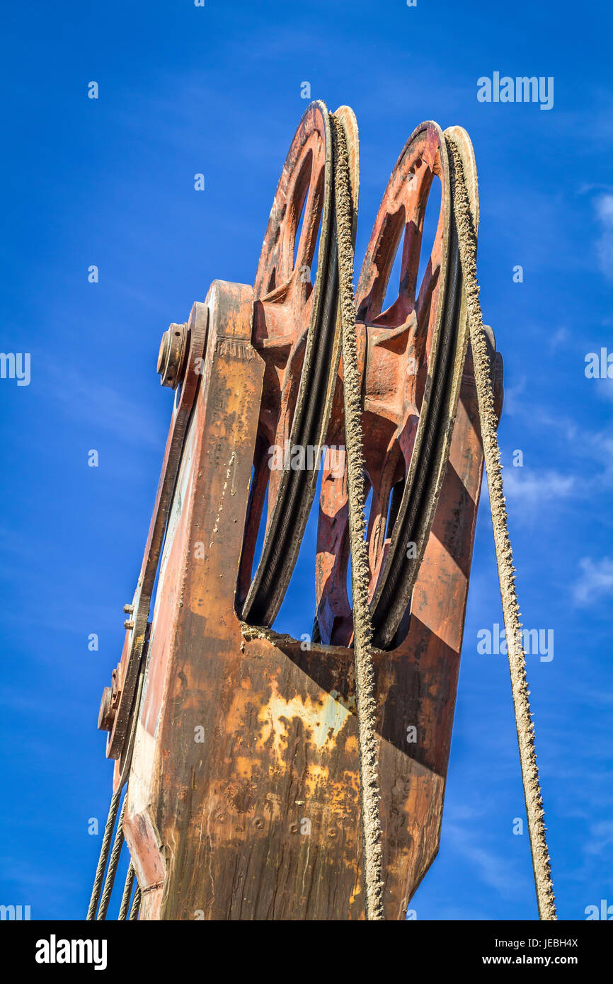 Boom hoist closeup on a background of blue sky Stock Photo Alamy