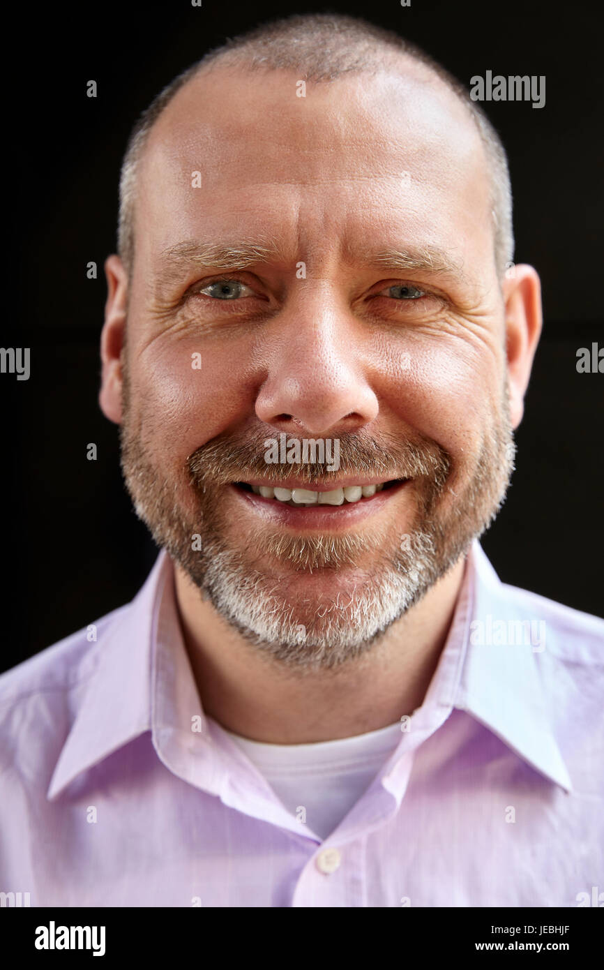 Man in pink shirt hi-res stock photography and images - Alamy
