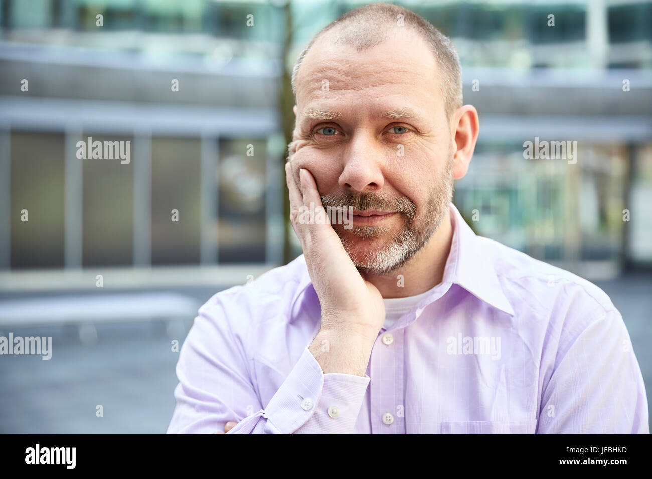 Pensive mature business man hi-res stock photography and images - Alamy
