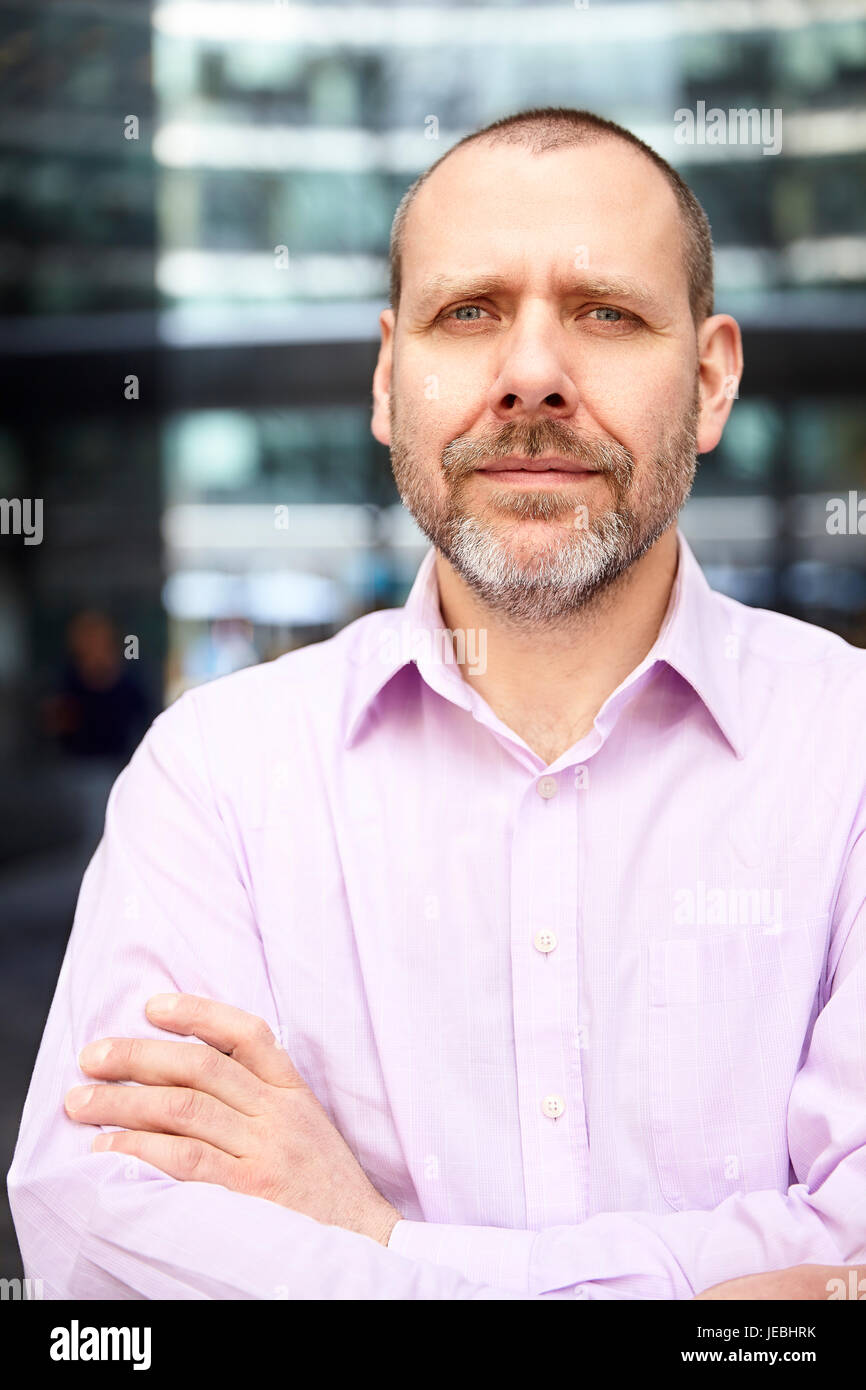Middle aged businessman standing hi-res stock photography and images ...