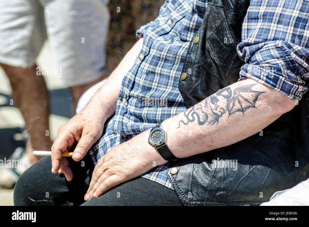 A Tattoo On An Arm Of A Gitan Smoking Before The Procession Of Santa Sara During The Festival Of The Gitans At Saintes Maries De La Mer In Provence France Stock Photo Alamy