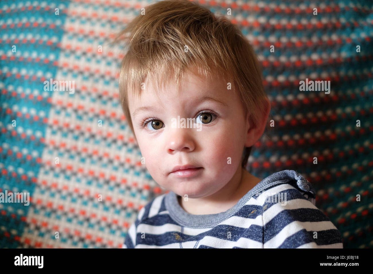 baby boy with big brown eyes Stock Photo Alamy
