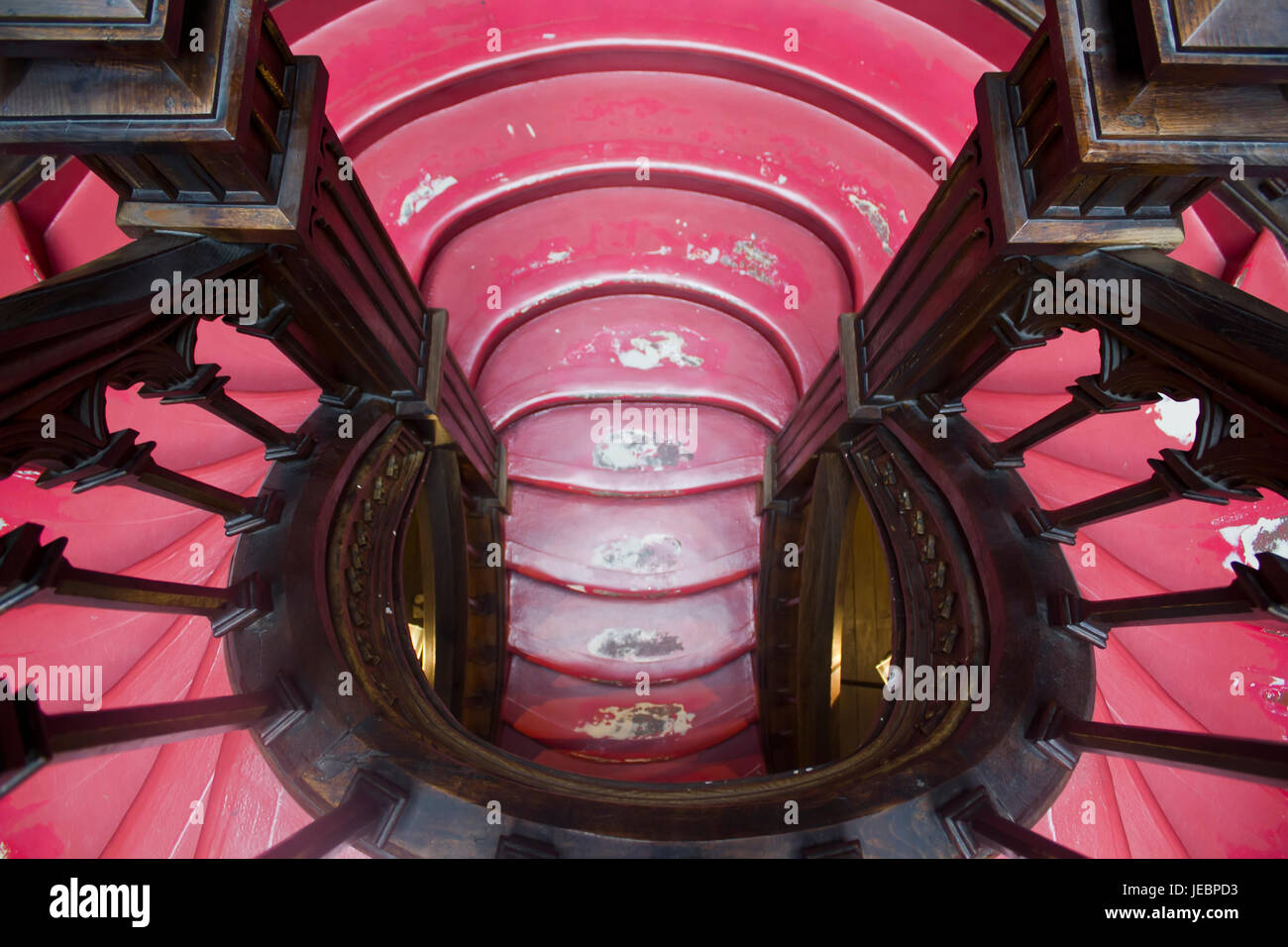 Old Spiral stairs in famous library, Livraria Lello & Irmão bookstore, Porto, Portugal Stock Photo