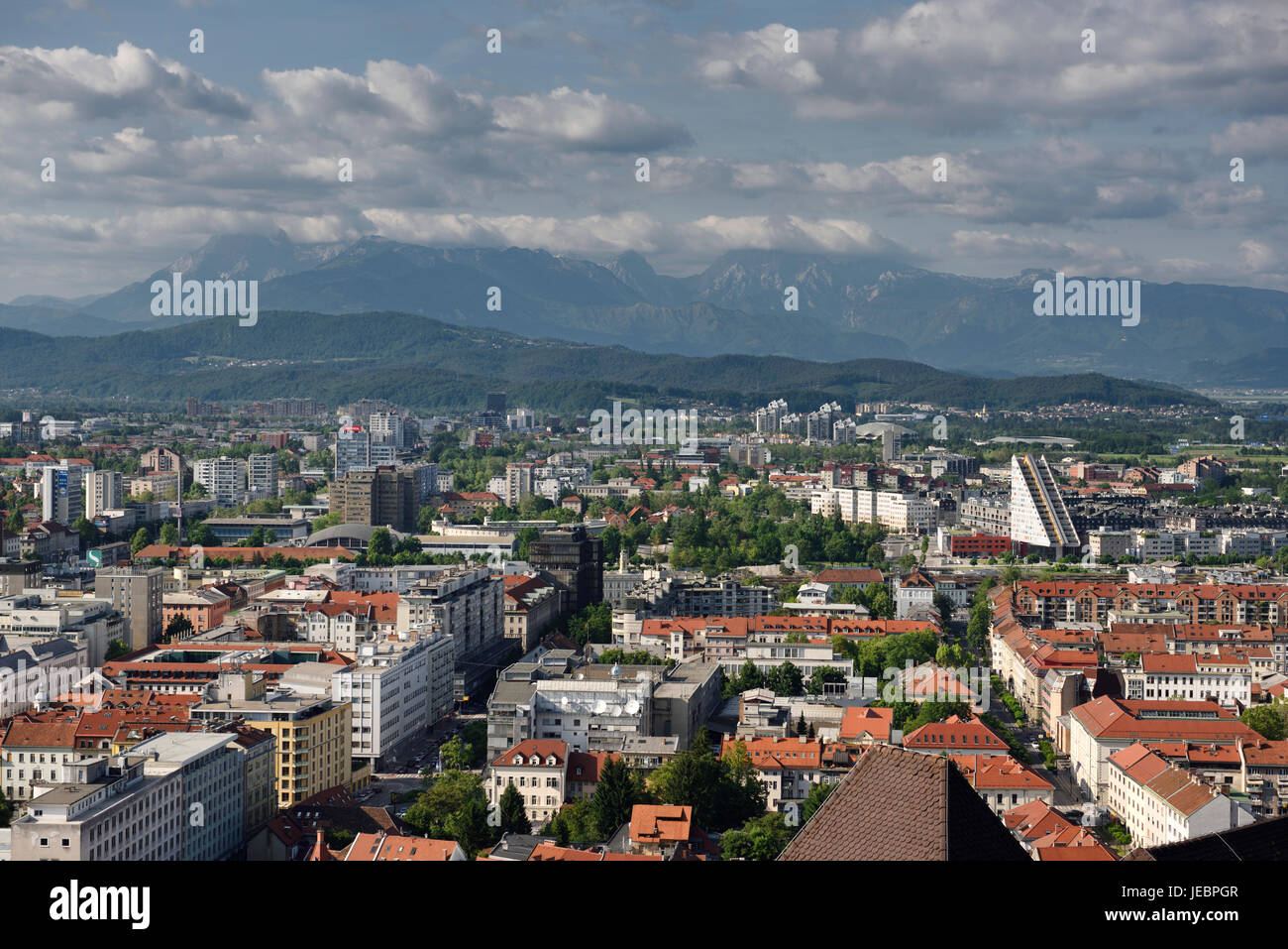 Overview of Ljubljana capital city of Slovenia with Mount Saint Mary and distant Kamnik Savinja Alps mountains from the hilltop Ljubljana Castle Stock Photo