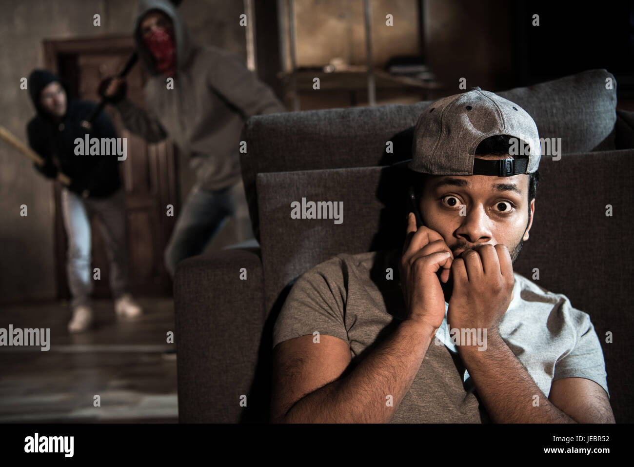 Hiding behind the sofa hires stock photography and images Alamy