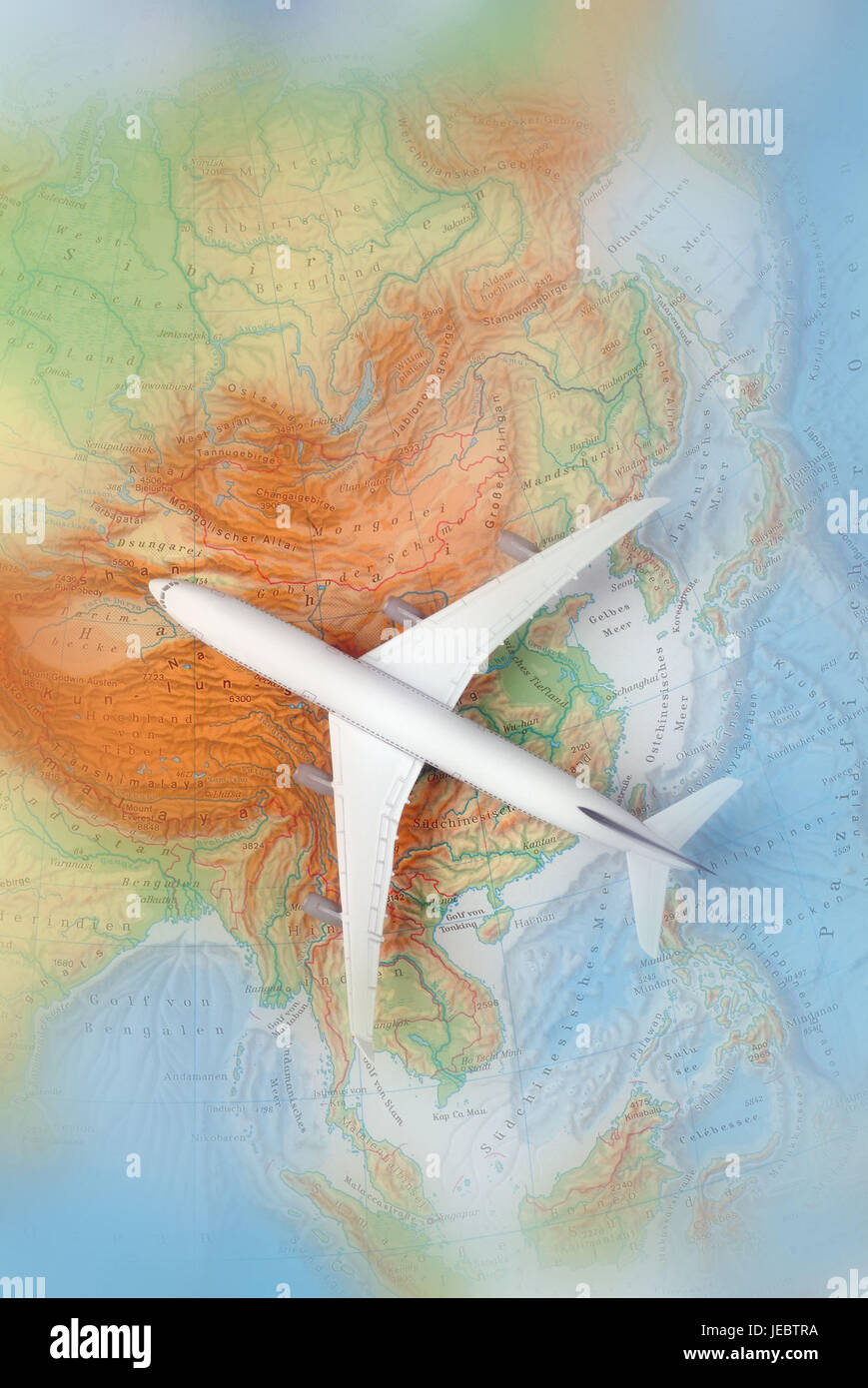 Airplane on a map of Asia, China, Japan, Korea, Stock Photo