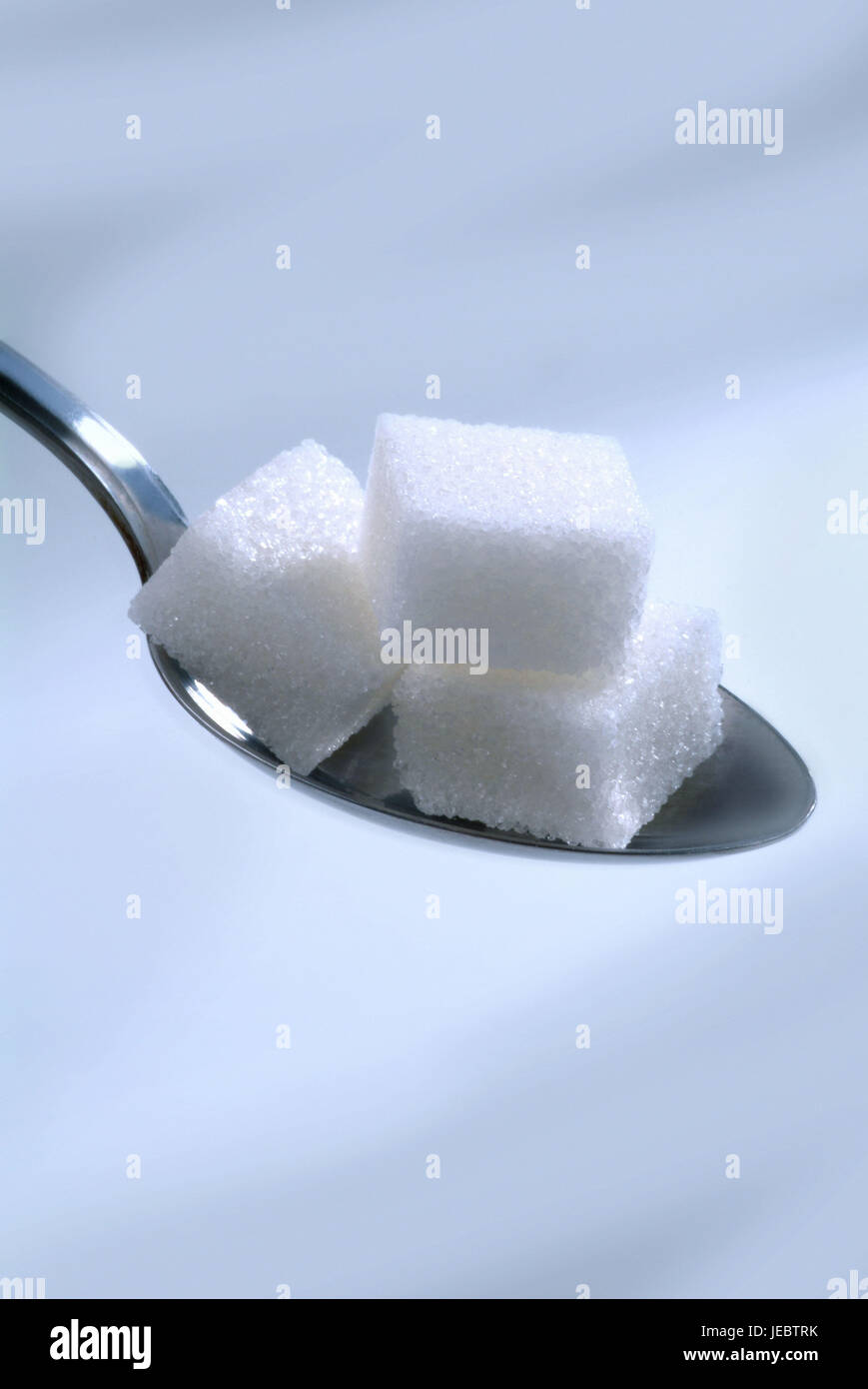 Spoon, sugar cube Stock Photo Alamy
