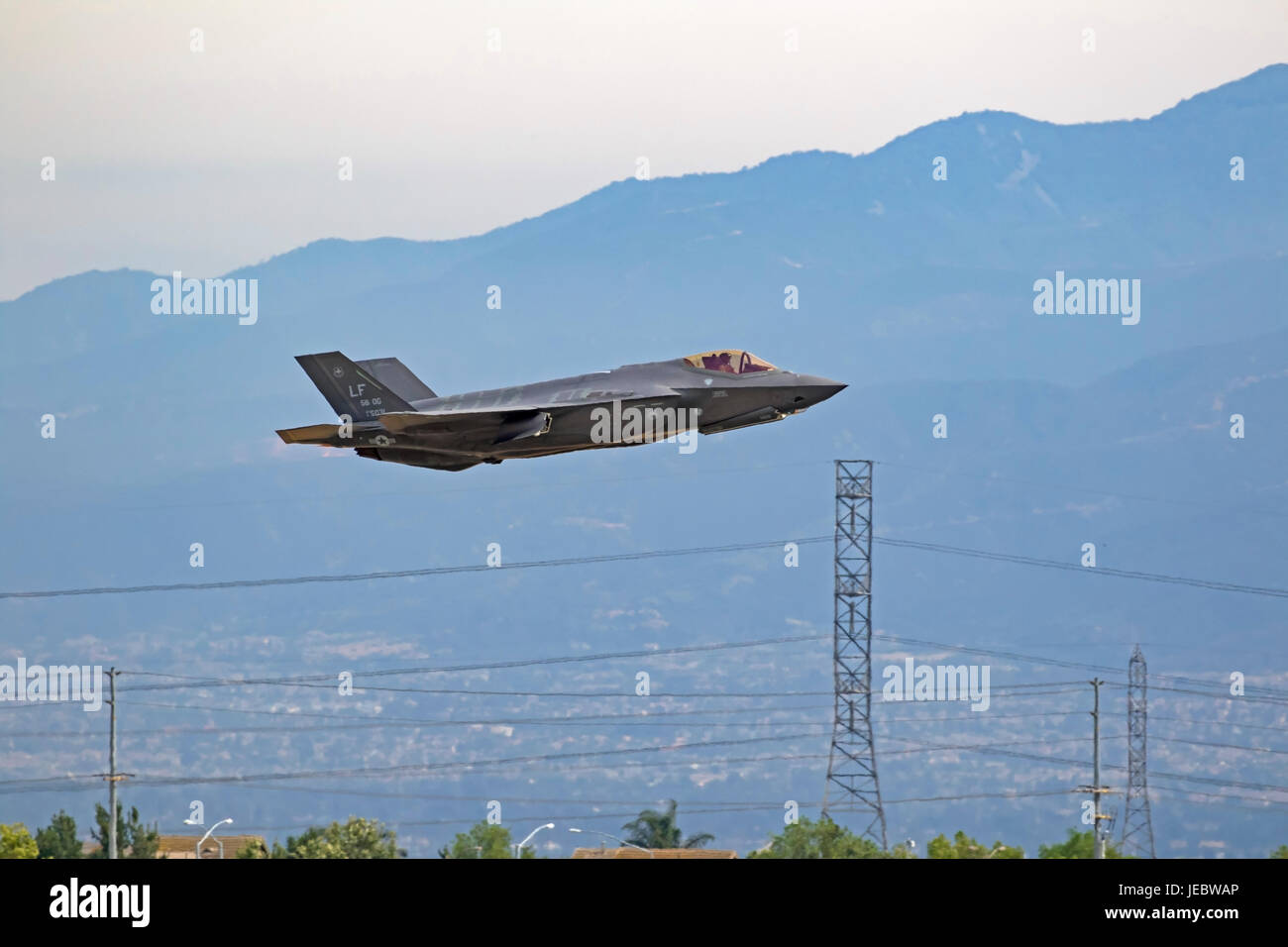 Airplane F-35 Lightning stealth jet fighter flying at California air show Stock Photo