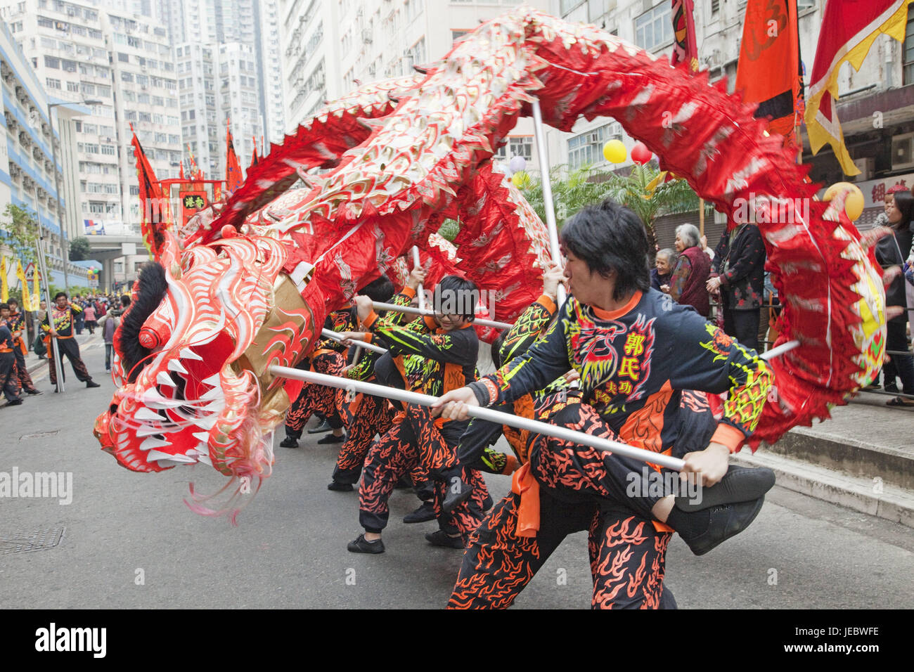 China, Hong Kong, dragon's dance, men, tradition, mass, tourism, save, dragon's dance, dance, culture, paper dragon, dragon, in Chinese, cogs, bite, person, tourist, Stock Photo