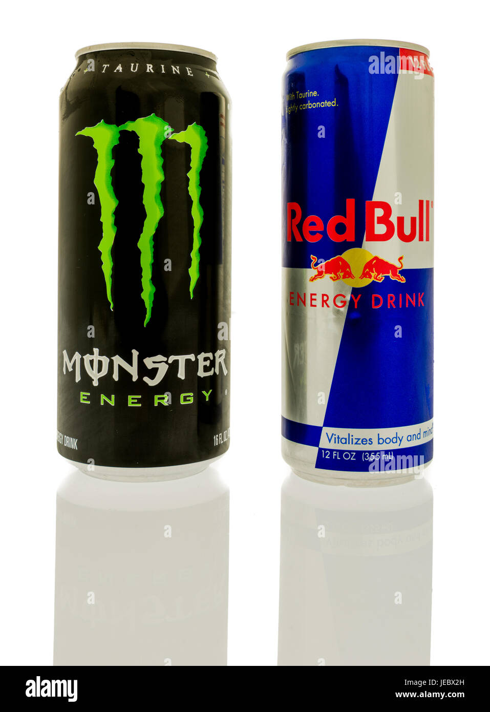 Winneconne, WI -17 June 2017: Cans of Red Bull and Monster energy drinks, the top two selling energy drinks in the world, on an isolated background Stock Photo
