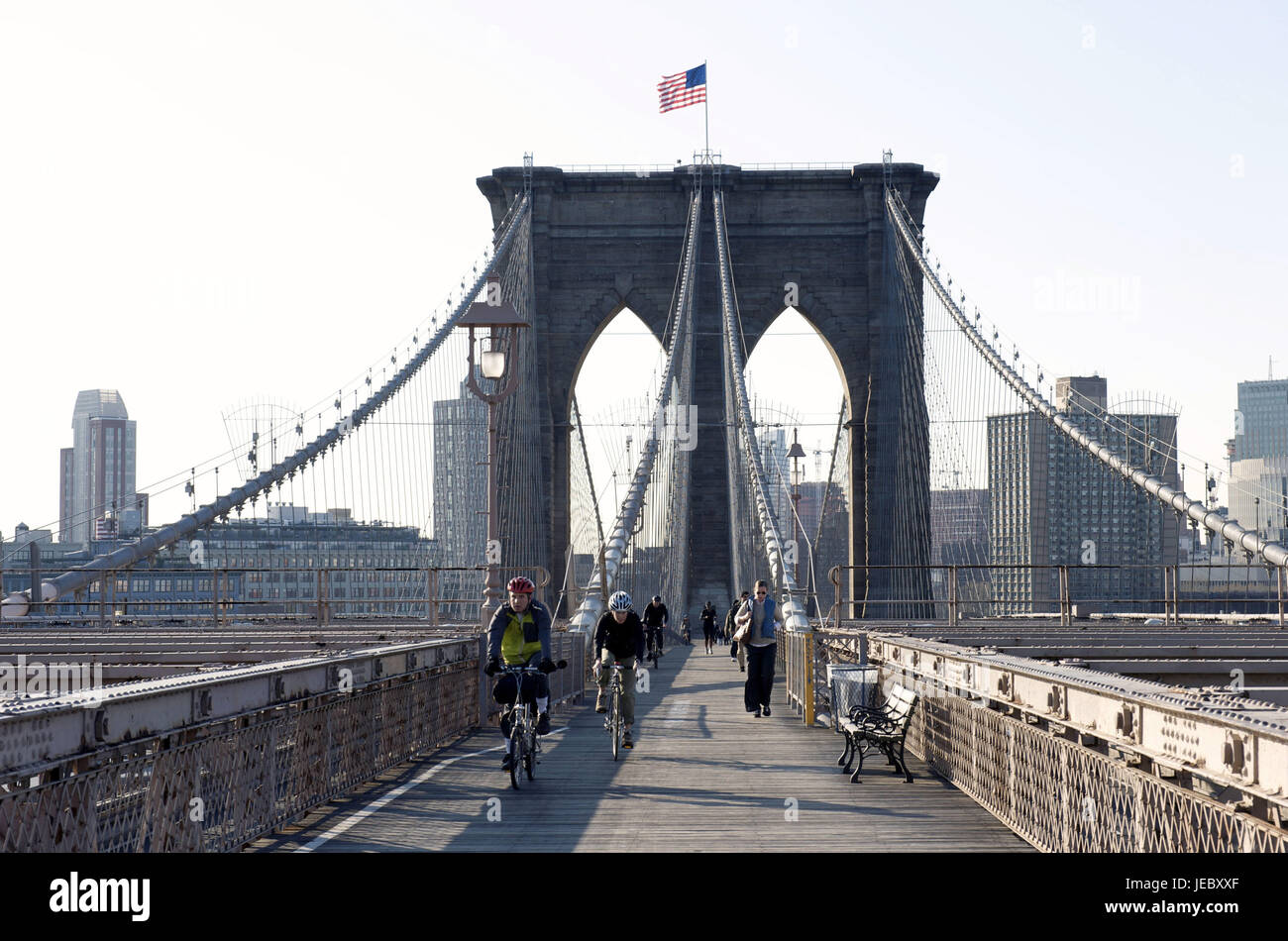 The USA, America, New York, Manhattan, cyclist and pedestrian on Brooklyn Bridge, Stock Photo