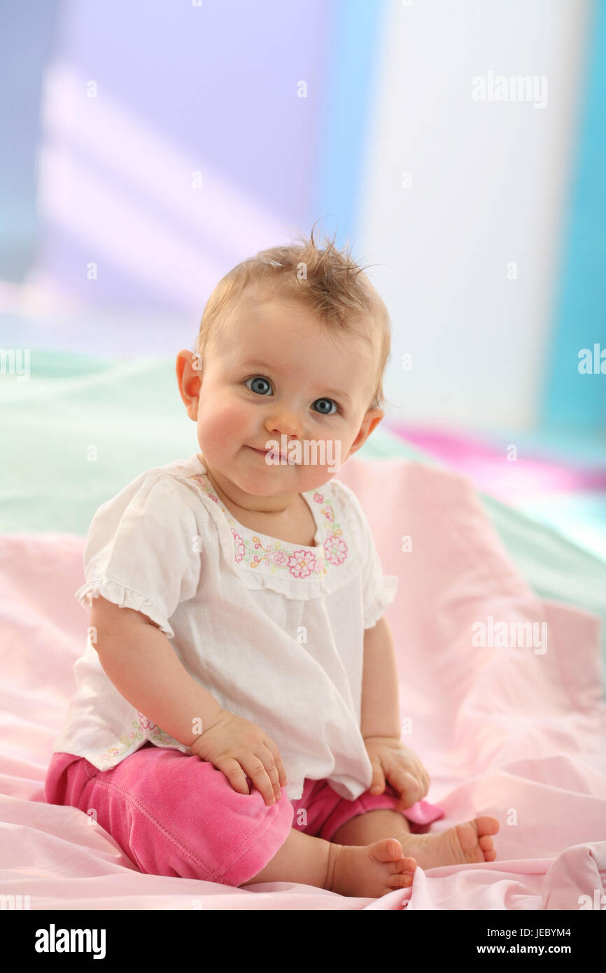Baby, 6 months, portrait, seated, Stock Photo