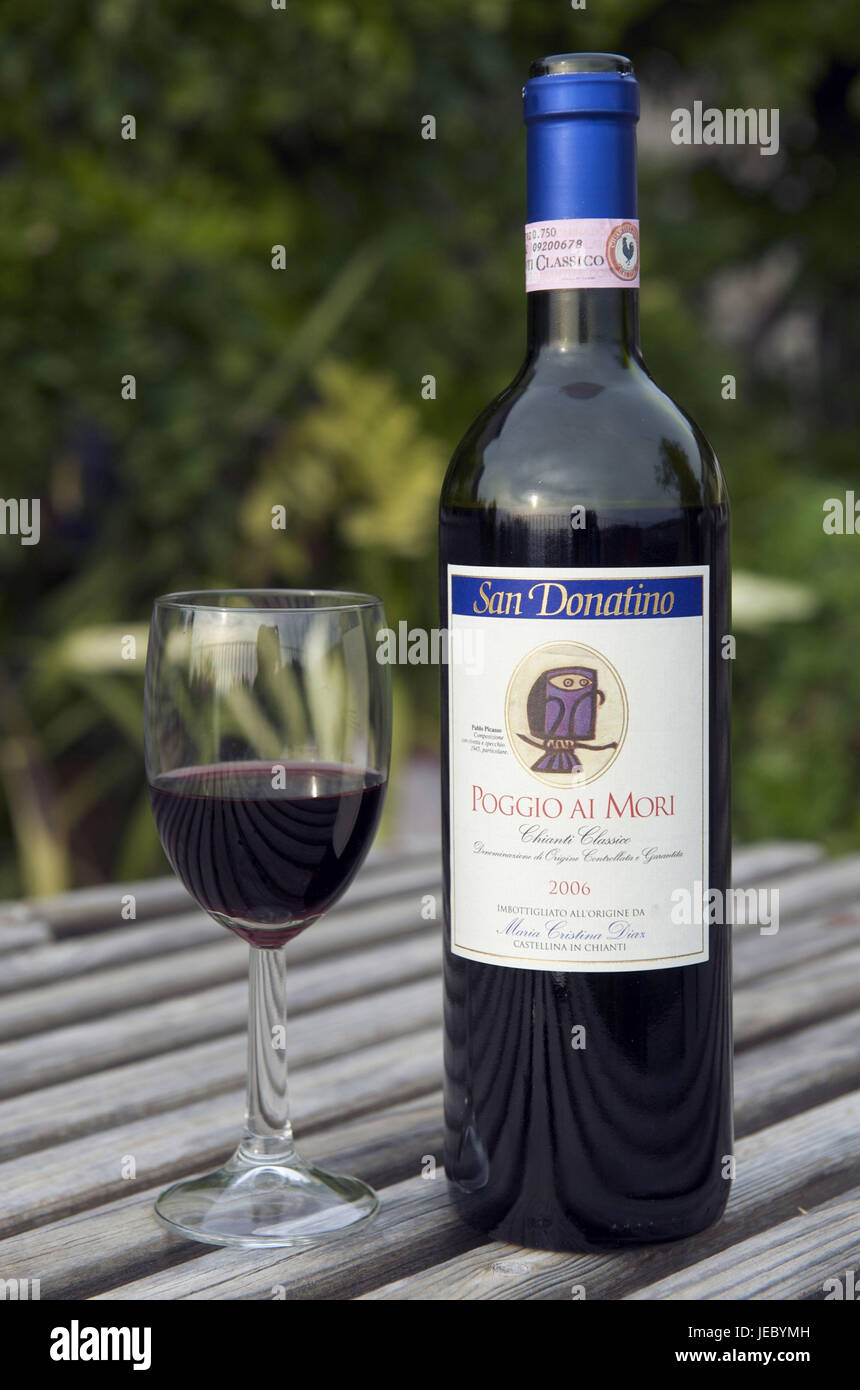 Italy, Tuscany, region Chianti, Castellina in Chianti, red wine flask on a table, Stock Photo