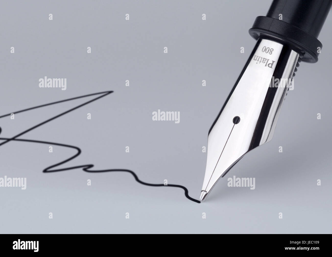 Board writing feather of a fountain pen with iridium point, Stock Photo
