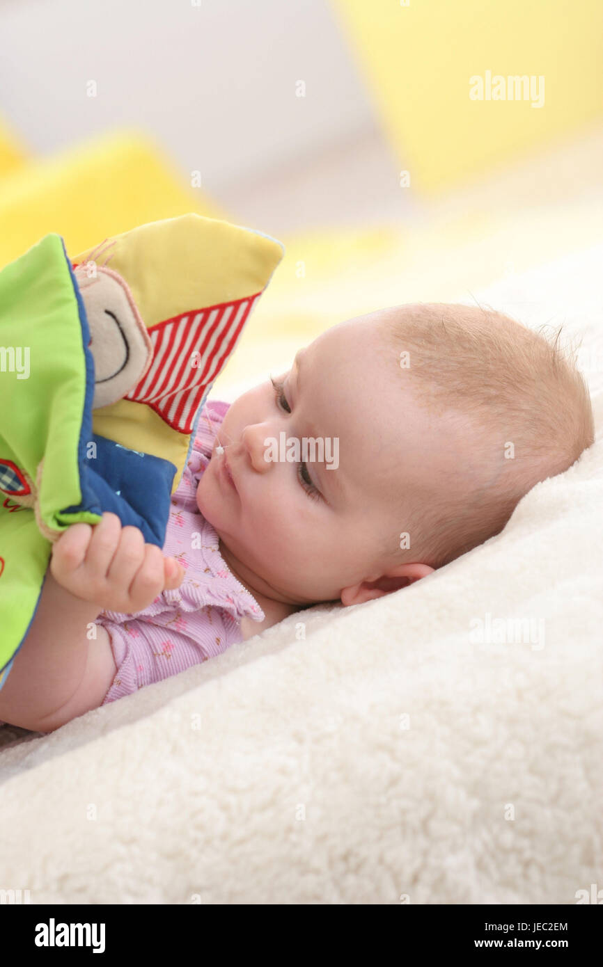 Baby, 4 months, play Stock Photo Alamy