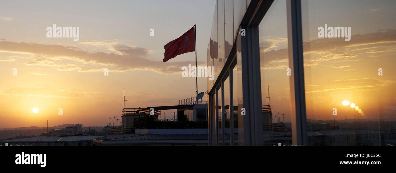 Turkey, Istanbul, Turkish flag is reflected in a window, sundown, Stock Photo