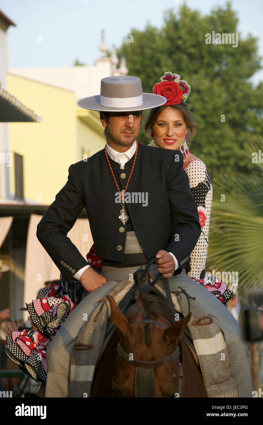 Spain Andalusia el Rocio Romeria couple in festive clothes on