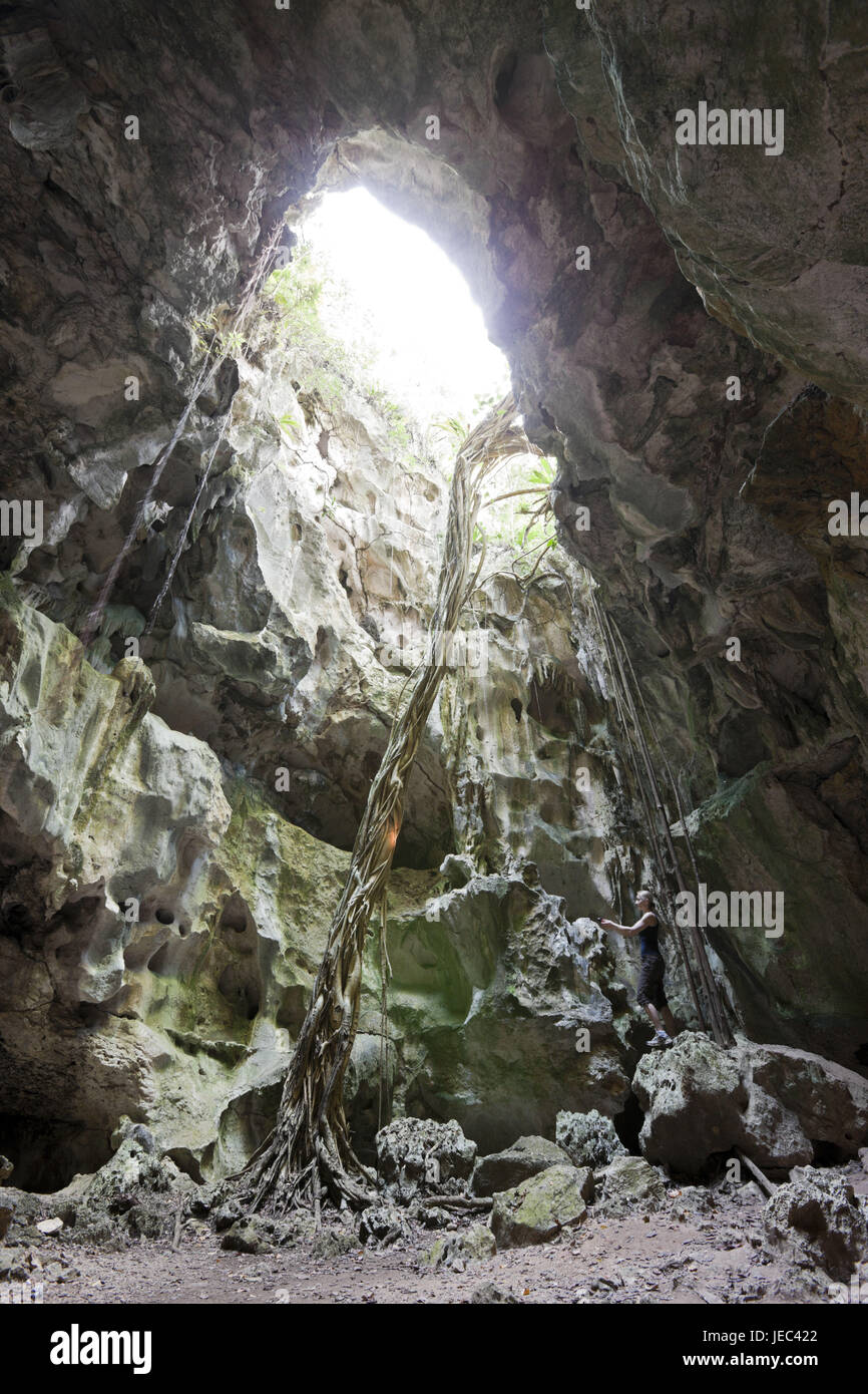 Tourist in limestone cave San Gabriel, national park batch Haitises, the Dominican Republic, Stock Photo