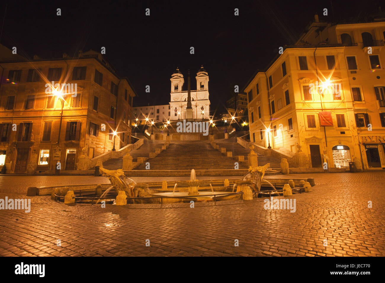 Italy, Rome, Piazza Tu Spagna, Fontana della Barcaccia, Spanish stairs and church Santa Trinita dei Monti, at night, Stock Photo