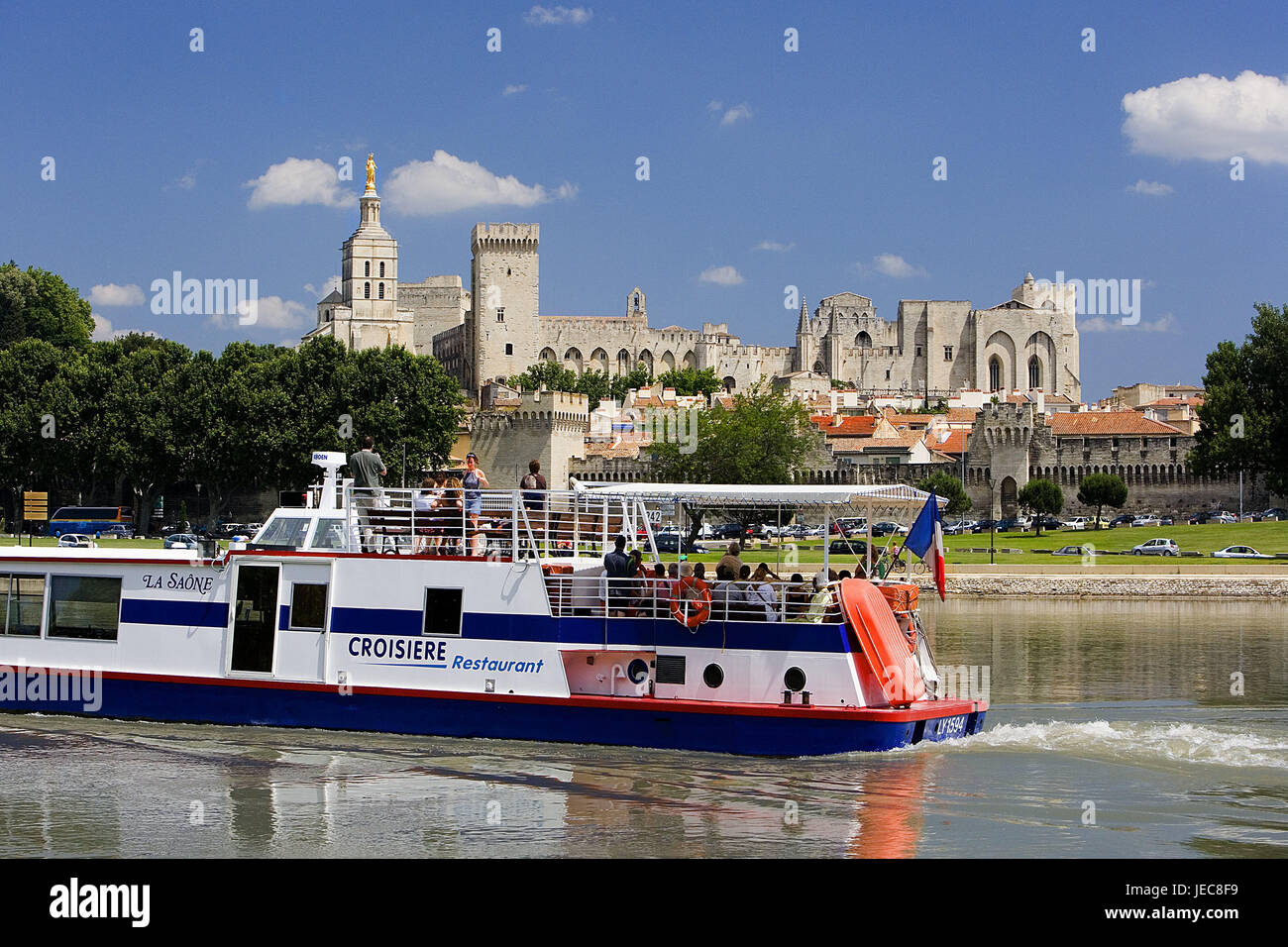 France, Provence, Avignon, town view, pope's palace, river, holiday ship, town, palace, doubles palace, structure, architecture, culture, place of interest, destination, tourism, UNESCO-world cultural heritage, the Rhone, ship, tourist, person, boat trip, boot tour, riverboat journey, summer, sightseeing, Stock Photo