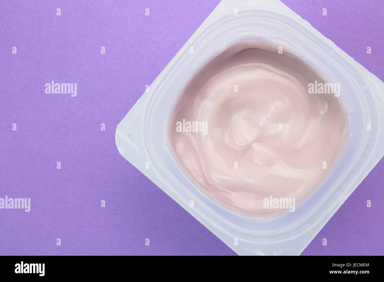 Healthy strawberry fruit flavoured yogurt with natural colouring in