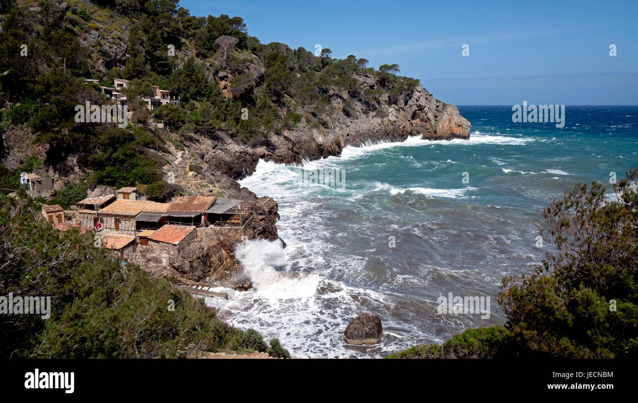 Rocky Shoreline of Deia in Tramuntana Mountains, Majorca, Balearic Island of Spain Stock Photo