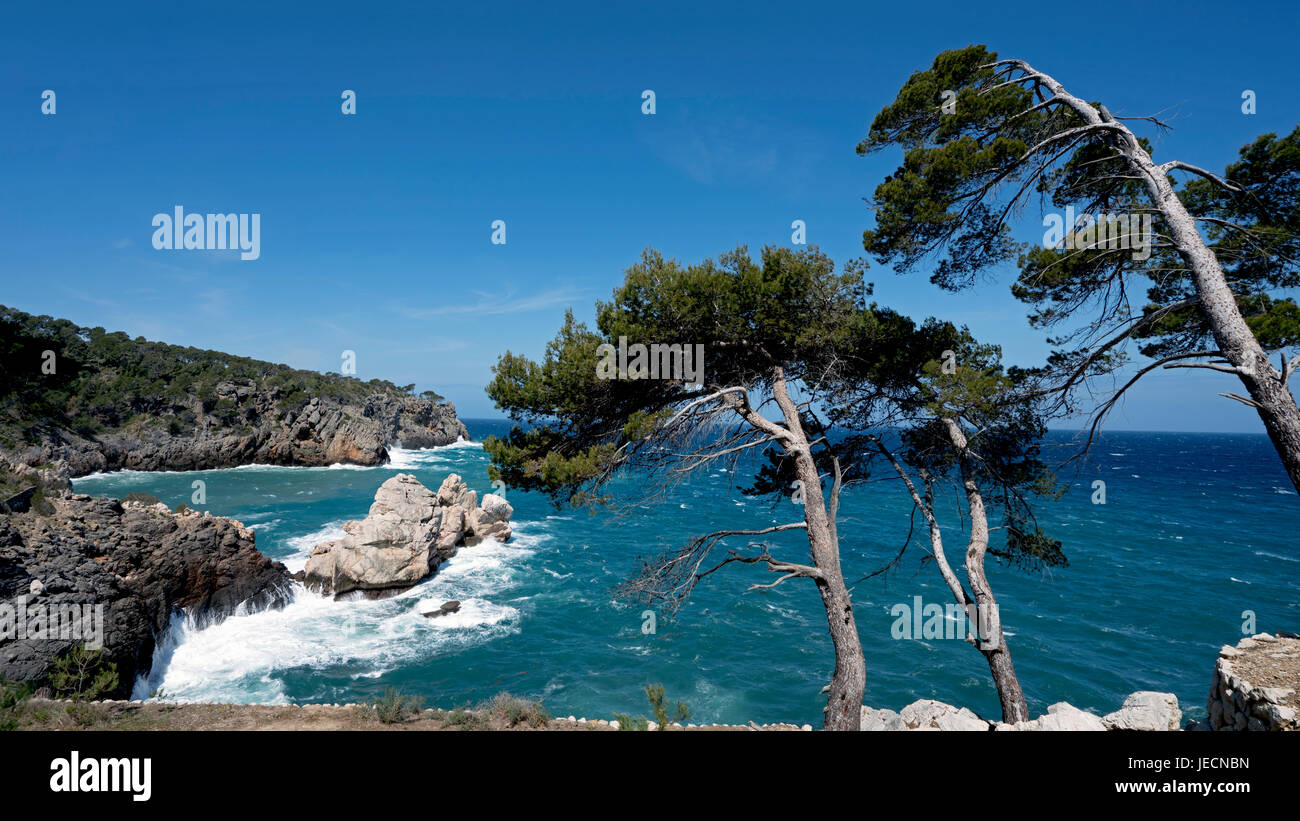 Rocky Shoreline of Deia in Tramuntana Mountains, Majorca, Balearic Island of Spain Stock Photo