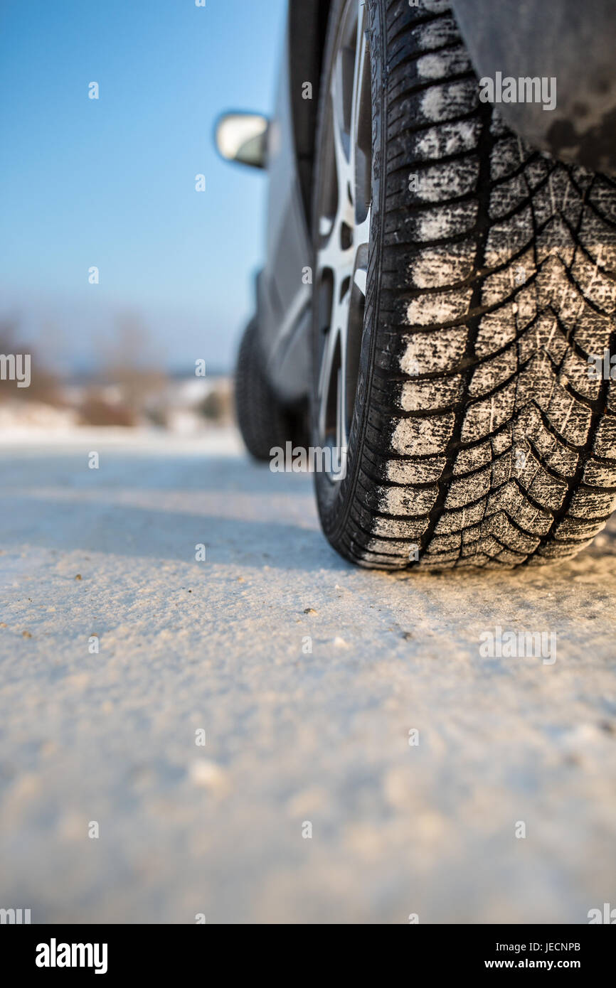 Car with winter tires on a slippery, snowy road Stock Photo Alamy