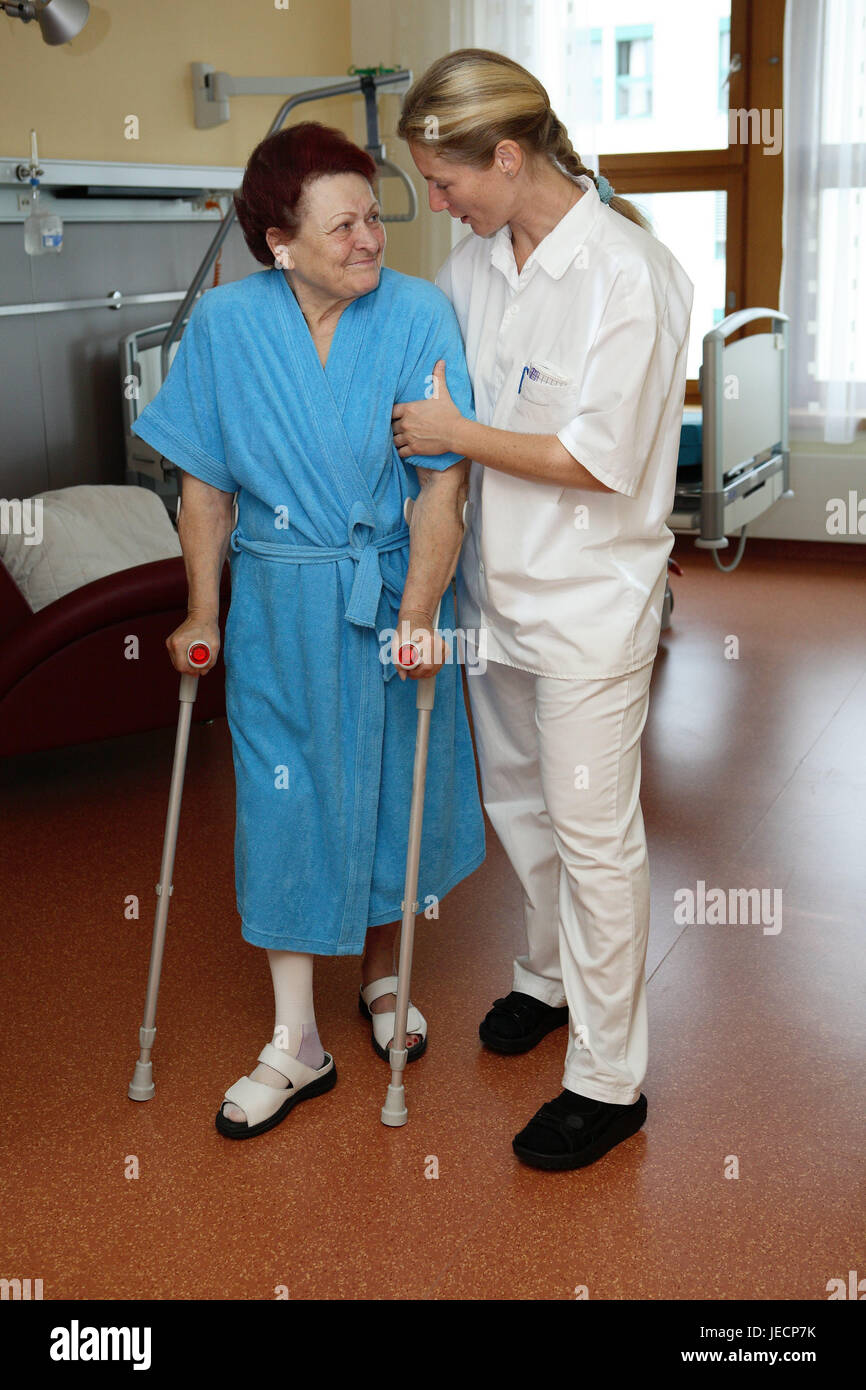 Clinic, physiotherapist, patient, senior, crutches, in need of care, lead, help, walking practise, eye contact, medicine, sick person's station, ward, occupation, nursing home, nursing occupations, people, women, two, nursing-destitute, old, bathrobe, nurse, nursing force, nurse, nursing staff, practice, train, support, support, help, allowance, care, care, convalescense, healing, rehabilitation, senior citizens, accompaniment, whole body, inside, Stock Photo