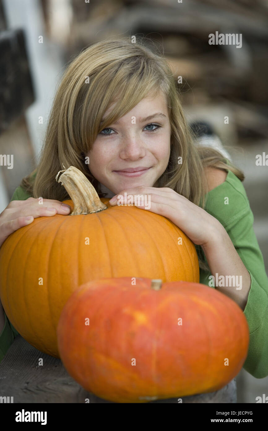 Girls, pumpkins, two, portrait, model released, people, teenagers, teenager's girls, blond, squashes, pride, harvest, outside, Stock Photo