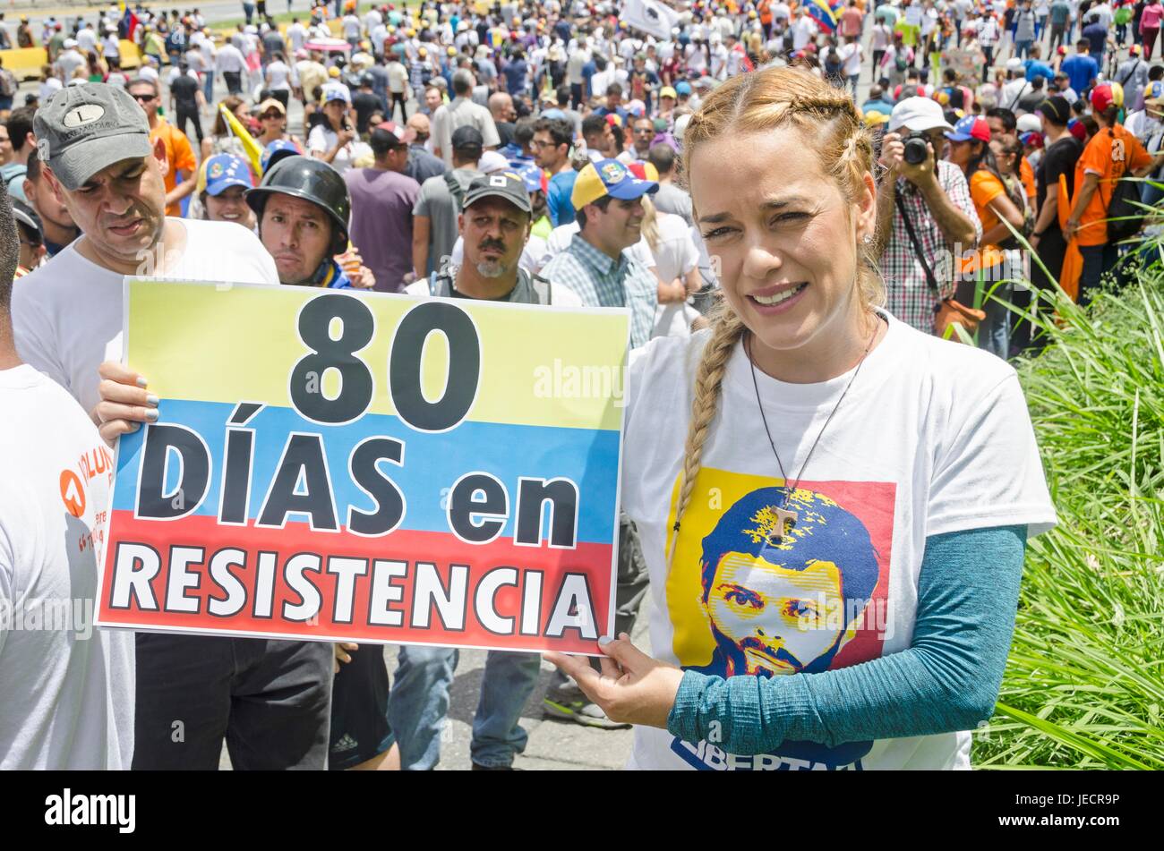 Lilian Tintori, wife of prominent jailed opposition leader Leopoldo Lopez, It shows a poster with the summary of the 80 days of protests, calling on t Stock Photo