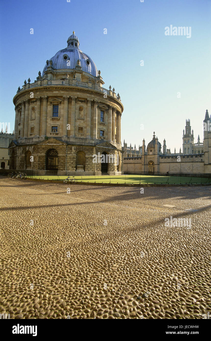 Great Britain, England, Oxfordshire, Oxford, Radcliffe Camera, library, paving-stones, pebbles, Europe, town, university town, university area, university, building, structure, architecture, historically, rotunda, outside, deserted, campus, icon, study, education, learning, knowledge, tradition, stone pavement, sunny, Stock Photo