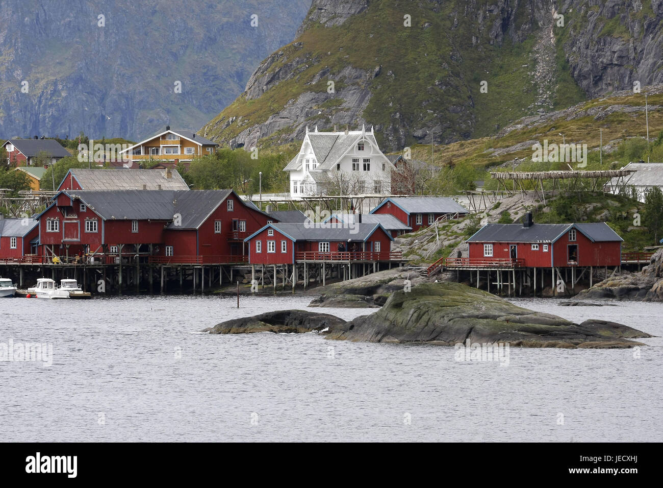 Rorbuer, traditional timber houses in the fishing village pure on the Lofoten island Moskenesoy, Stock Photo