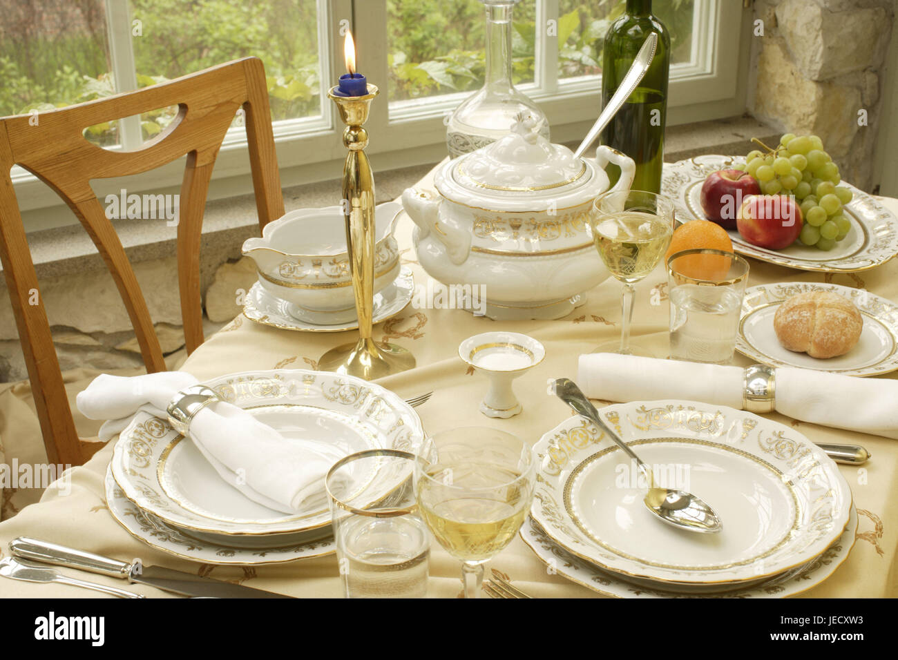 Table, covered, porcelain, elegantly, dishes, china, covers, plates, sauceboat, soup tureen, tureen, wine, wine flask, wineglasses, glasses, decanter, water, fruit plate, fruit, grapes, apples, orange, brass candlestick, skyer, candle-light, substance napkins, napkin rings, festively, flatware, chair, window, nobody, Stock Photo