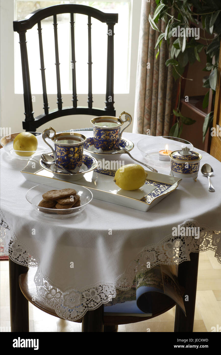 Coffee table, covered, porcelain, elegantly, lemons, table, around, tablet, dishes, china, tea service, two, cups, tea drinking, Teatime, biscuits, sugar bowl, teaspoon, table caps, white, tea warmer candle, skyer light, chair, nobody, Stock Photo