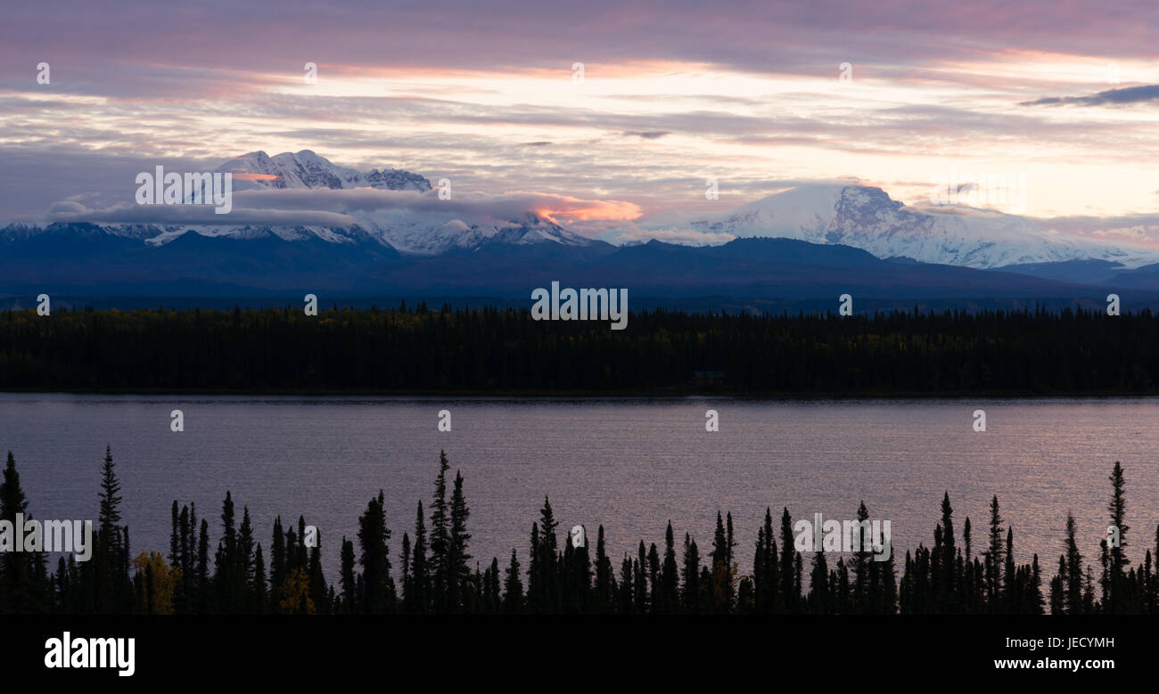 It's sunrise in Alaska over Willow Lake and Mt. Blackburn Stock Photo
