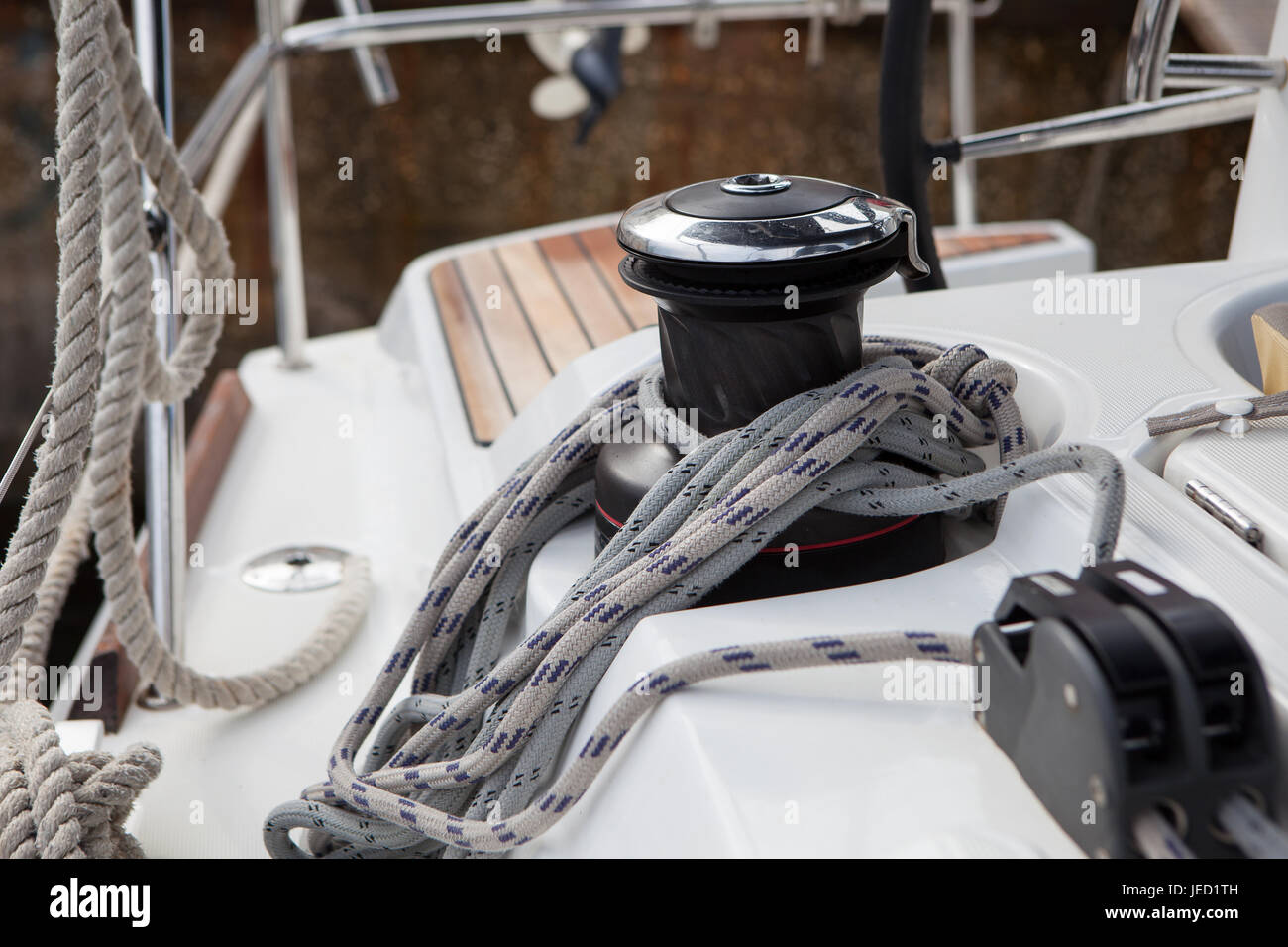 Windlass and mooring rope on sailing boat in the early morning in the