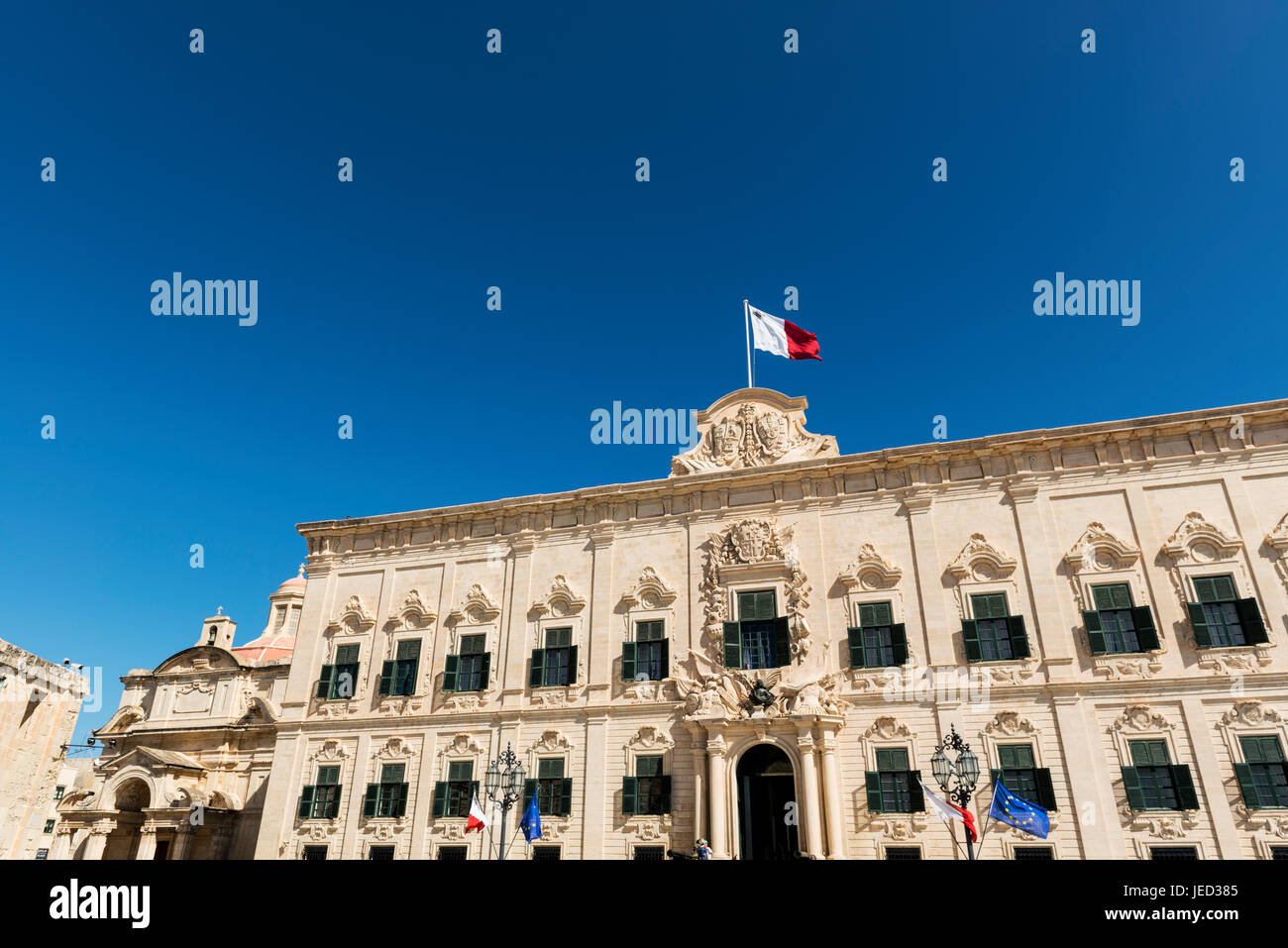 The lovely proportionate Auberge de Castille is a baroque palace in Valletta, currently the offices of the Prime Minister of Malta. Stock Photo