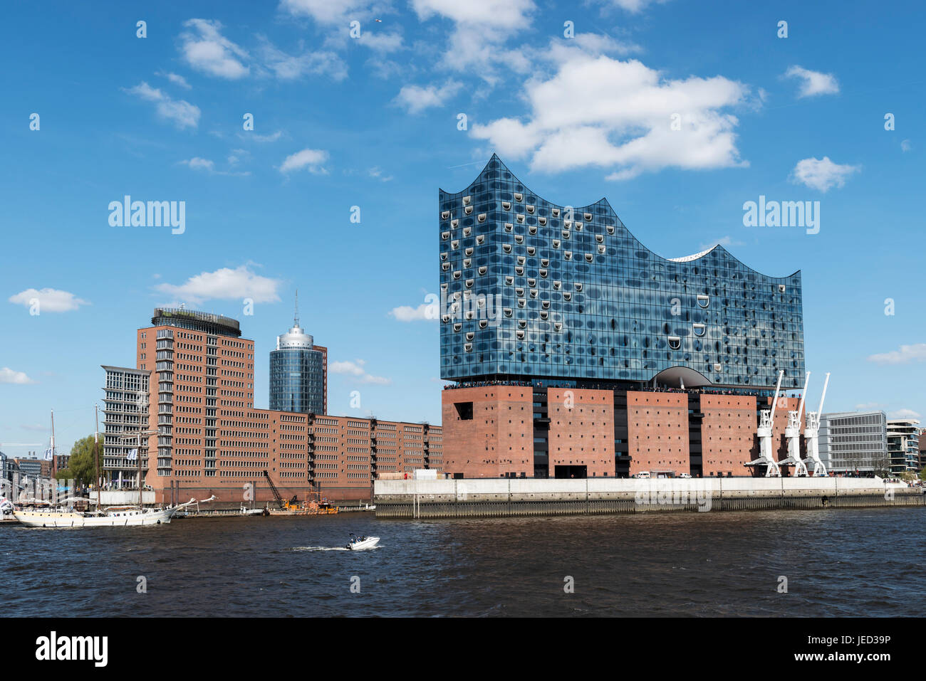 Elbphilharmonie, Hamburg's new landmark concert hall, is being erected on a former port warehouse with a shining glass facade Stock Photo
