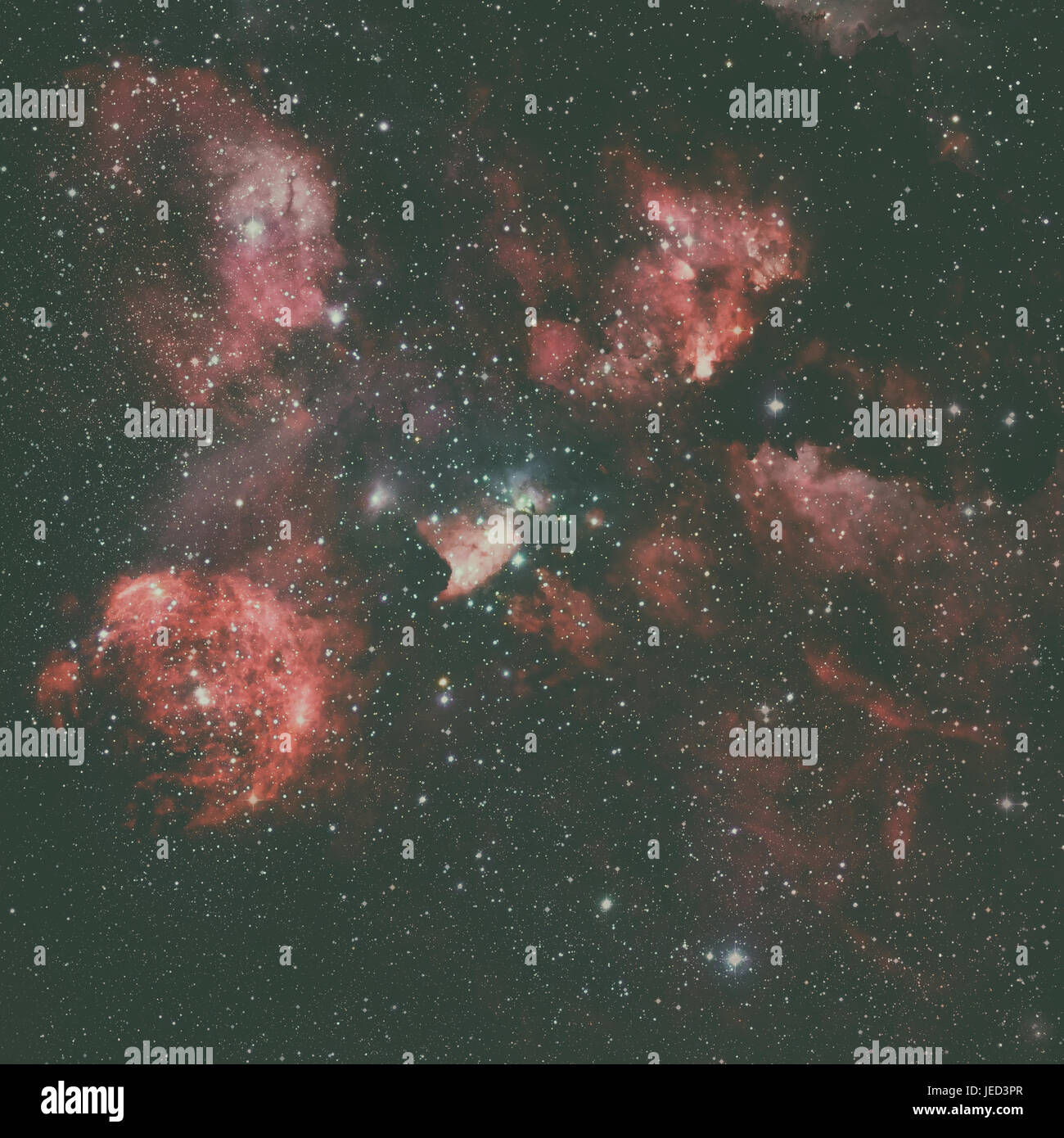 The Cat's Paw Nebula or NGC 6334 lies in the constellation of Scorpius. Elements of this image furnished by NASA. Stock Photo