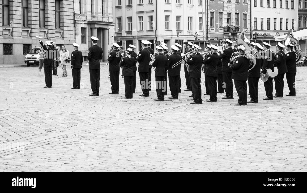 RIGA, LATVIA - SEPTEMBER 10, 2008: military band playing music on Doma Laukums square in Old Riga town in autumn. Riga city historical centre is a UNE Stock Photo