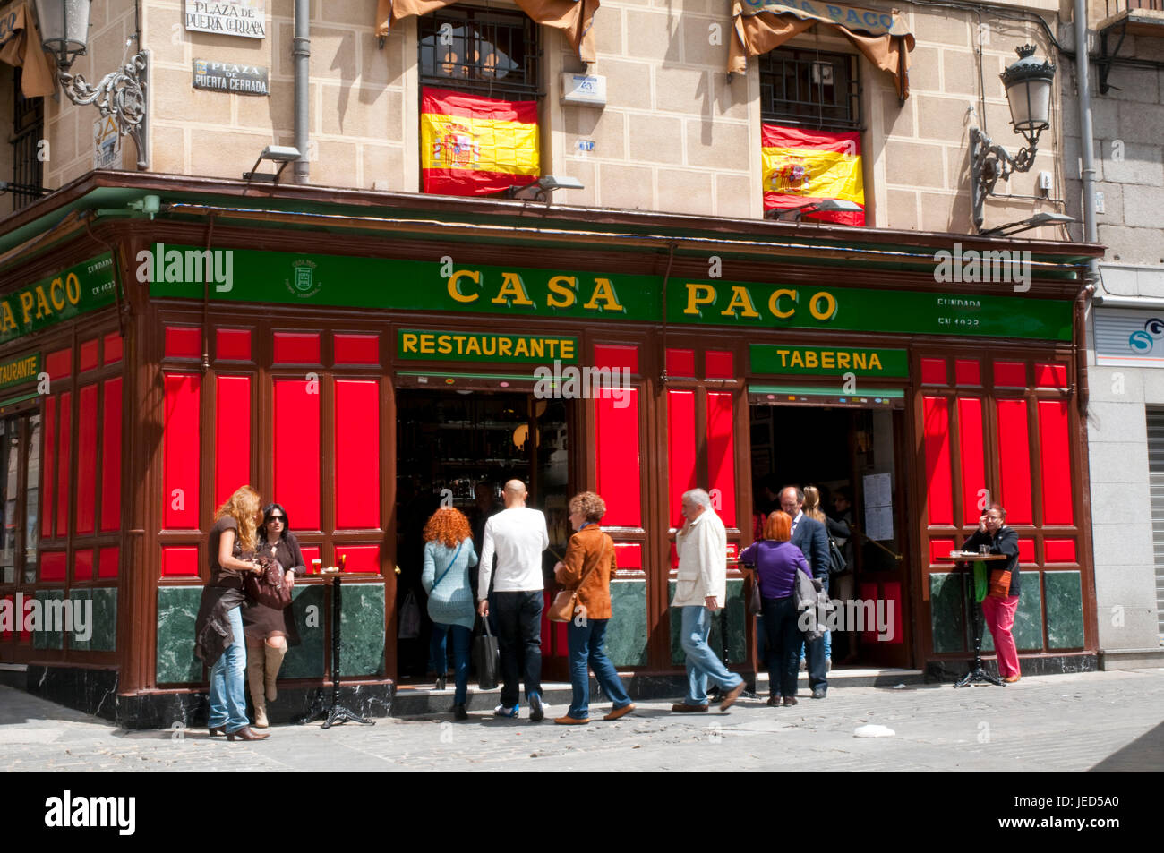 People at Casa Paco restaurant, Puerta Cerrada Square. Madrid, Spain. Stock Photo