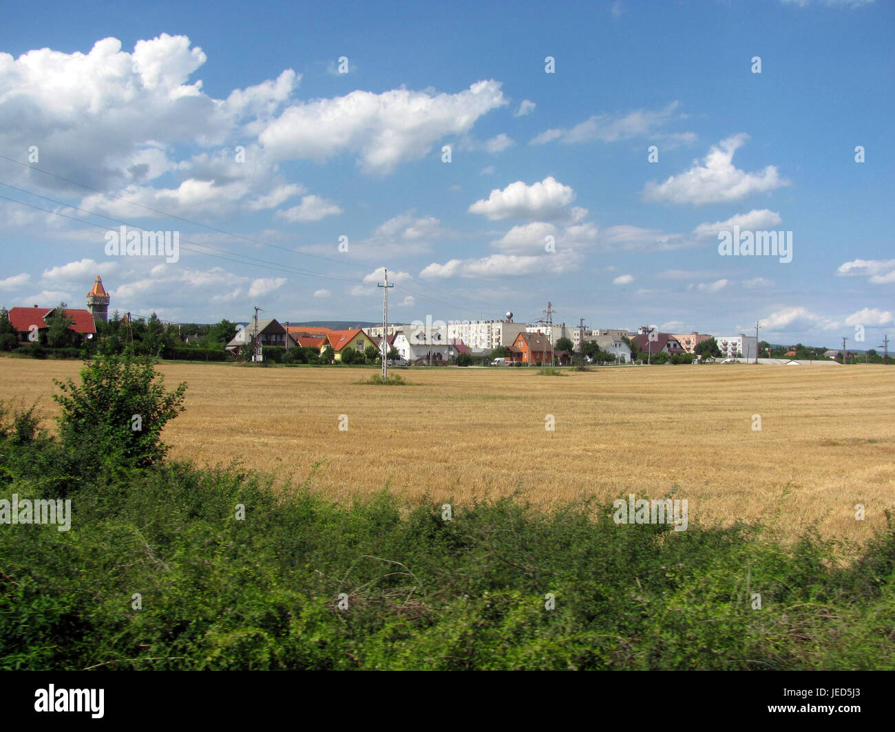 View of the small city from window of train. Stock Photo