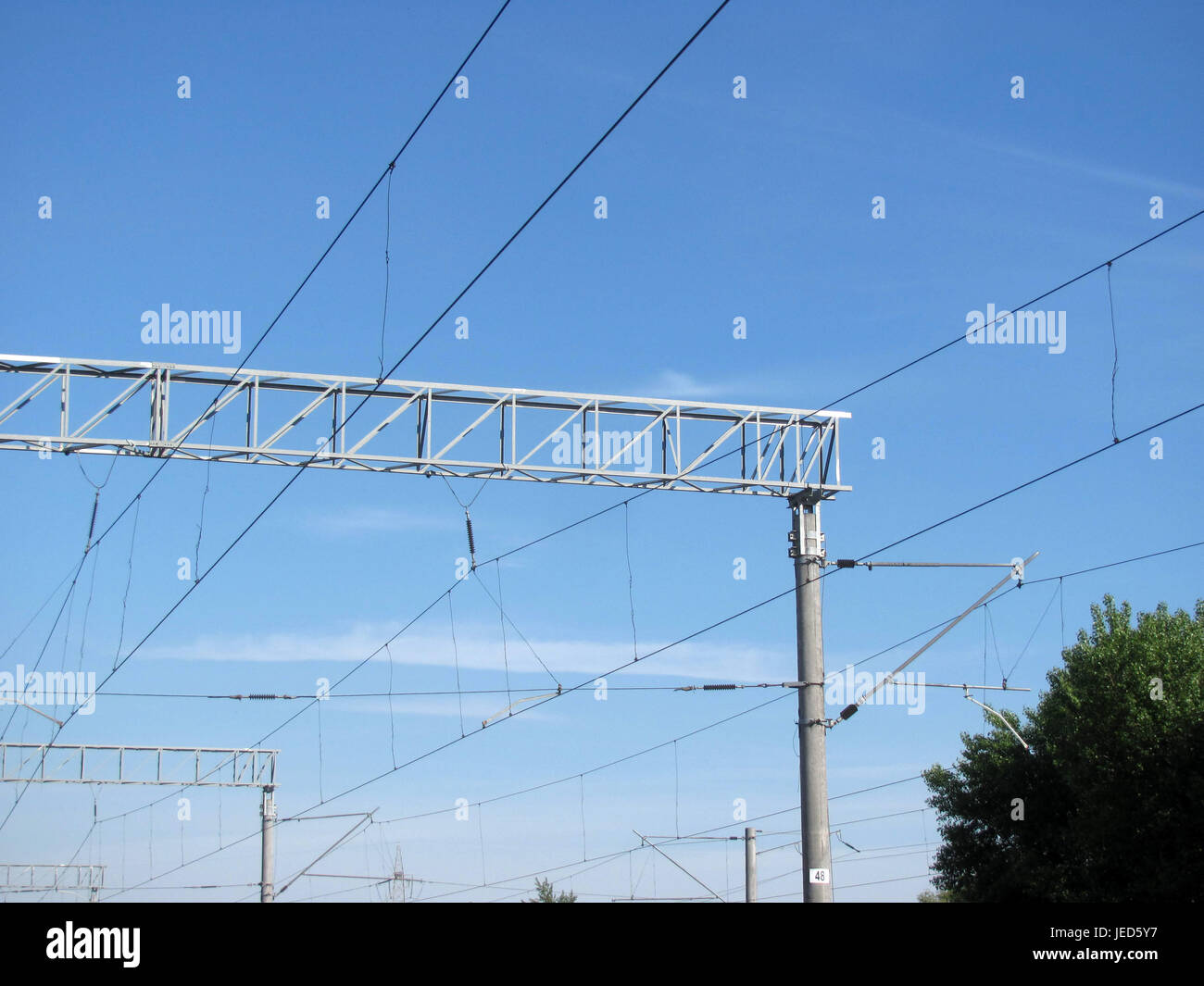 Railway, masts of the contact network. Stock Photo